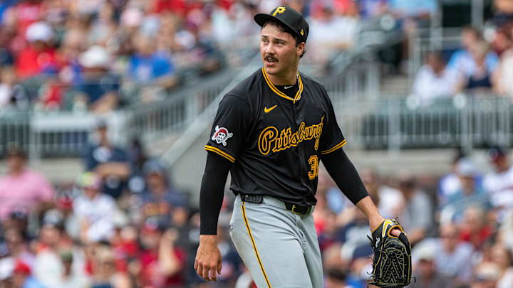 Jun 29, 2024; Cumberland, Georgia, USA; Pittsburgh Pirates pitcher Paul Skenes (30) walks to the dugout after pitching the first inning against Atlanta Braves during the first inning at Truist Park. Mandatory Credit: Jordan Godfree-Imagn Images