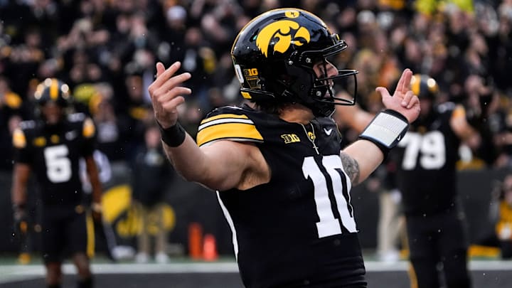 Iowa Hawkeyes quarterback Jeremy Hecklinski (10) celebrates after scoring a touchdown against the Minnesota Golden Gophers Oct. 25, 2025 at Kinnick Stadium in Iowa City, Iowa. Iowa Hawkeyes quarterback Jeremy Hecklinski (10) celebrates after scoring a touchdown against the Minnesota Golden Gophers Oct. 25, 2025 at Kinnick Stadium in Iowa City, Iowa.