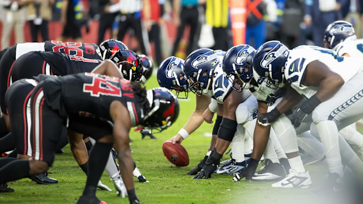 Dec 8, 2024; Glendale, Arizona, USA; General view down the line of scrimmage as the Seattle Seahawks prepare to snap the ball against the Arizona Cardinals at State Farm Stadium.