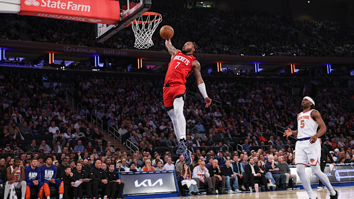 Feb 3, 2025; New York, New York, USA; Houston Rockets forward Cam Whitmore (7) goes up for a dunk during the first half in front of New York Knicks forward Precious Achiuwa (5) at Madison Square Garden. Mandatory Credit: Vincent Carchietta-Imagn Images
