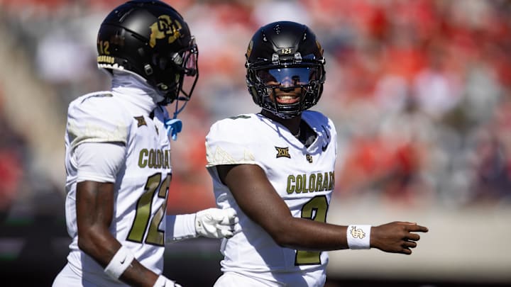 Colorado Buffalos quarterback Shedeur Sanders (2) with wide receiver Travis Hunter (12) against the Arizona Wildcats at Arizona Stadium. Colorado Buffalos quarterback Shedeur Sanders (2) with wide receiver Travis Hunter (12) against the Arizona Wildcats at Arizona Stadium.