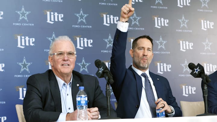 Dallas Cowboys CEO Stephen Jones and head coach Brian Schottenheimer speak to the media at a press conference.