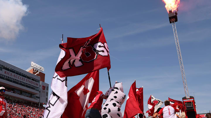 Utah Utes students run out on the field ahead of the team before the game against the Baylor Bears at Rice-Eccles Stadium. Utah Utes students run out on the field ahead of the team before the game against the Baylor Bears at Rice-Eccles Stadium.
