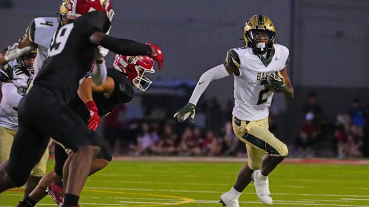 Basha wide receiver Jaden Baldwin (2) sprints after a reception against Brophy Prep during a game at Central High School in Phoenix on Aug. 28, 2025.
