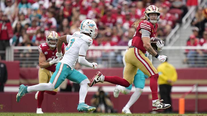 San Francisco 49ers tight end George Kittle (85) runs the ball against Miami Dolphins cornerback Chris Johnson (3) in the second half at Levi's Stadium.  