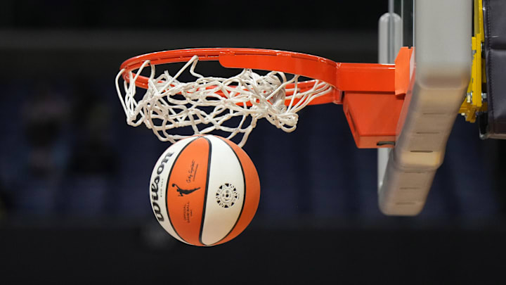May 25, 2023; Los Angeles, California, USA; Wilson official basketball with WNBA logo goes through the net during the game between the LA Sparks and the Las Vegas Aces at Crypto.com Arena. Mandatory Credit: Kirby Lee-Imagn Images