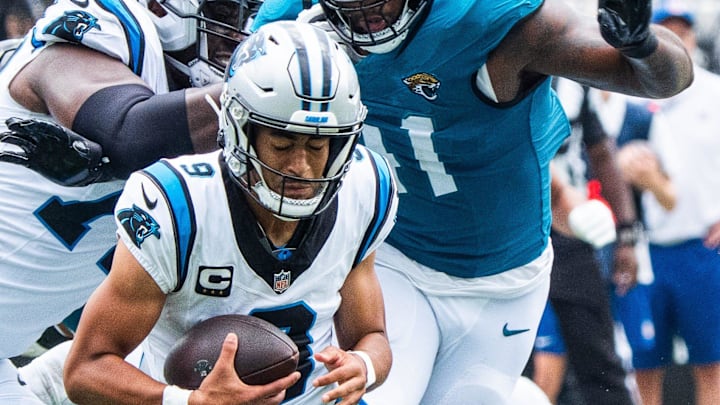 Jacksonville Jaguars defensive end Josh Hines-Allen (41) pressures Carolina Panthers quarterback Bryce Young (9) during the second quarter of an NFL football game between the Carolina Panthers at Jacksonville Jaguars at EverBank Stadium Sunday September 7, 2025. [Doug Engle/Florida Times-Union]