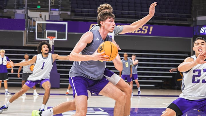 Christian Nitu goes through a UW practice drill. Christian Nitu goes through a UW practice drill.