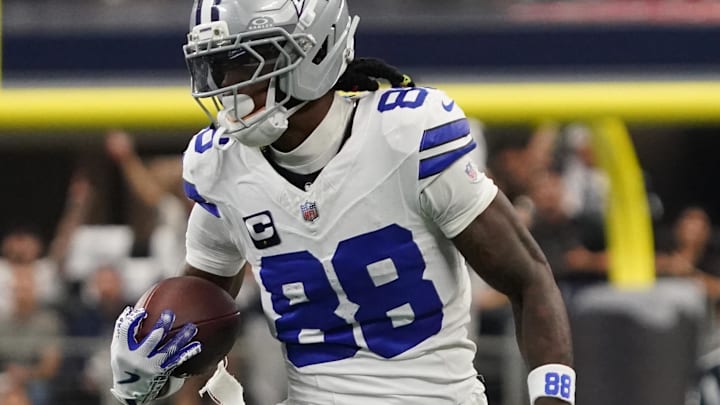Sep 14, 2025; Arlington, Texas, USA; Dallas Cowboys wide receiver CeeDee Lamb (88) runs with the ball against the New York Giants at AT&T Stadium. 