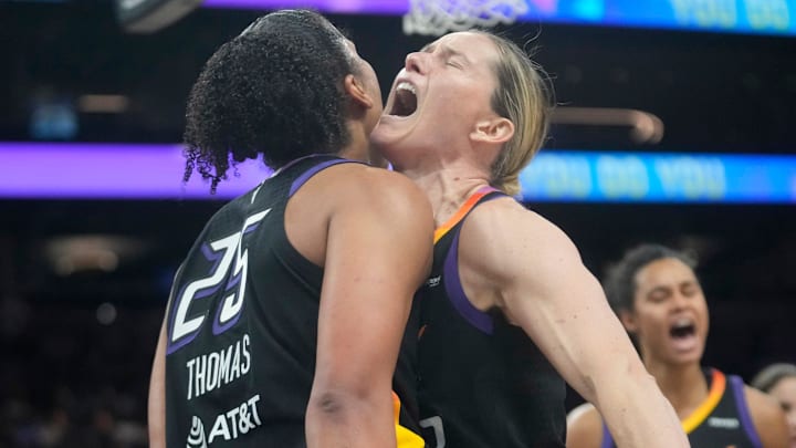 Phoenix Mercury forward Alyssa Thomas (25) celebrates a basket and foul with guard Sami Whitcomb (33) against the Washington Mystics during the fourth quarter at PHX Arena May 25, 2025.