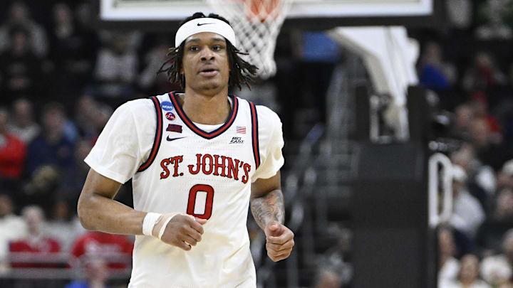 Mar 20, 2025; Providence, RI, USA; St. John's Red Storm guard Aaron Scott (0) runs down court during the second half against the Omaha Mavericks at Amica Mutual Pavilion. Mandatory Credit: Eric Canha-Imagn Images Mar 20, 2025; Providence, RI, USA; St. John's Red Storm guard Aaron Scott (0) runs down court during the second half against the Omaha Mavericks at Amica Mutual Pavilion. Mandatory Credit: Eric Canha-Imagn Images