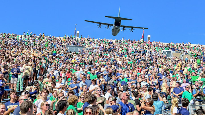 Sep 21, 2024; South Bend, Indiana, USA; A C130 aircraft does a flyover at Notre Dame Stadium before the game between the Notre Dame Fighting Irish and the Miami Redhawks. Mandatory Credit: Matt Cashore-Imagn Images