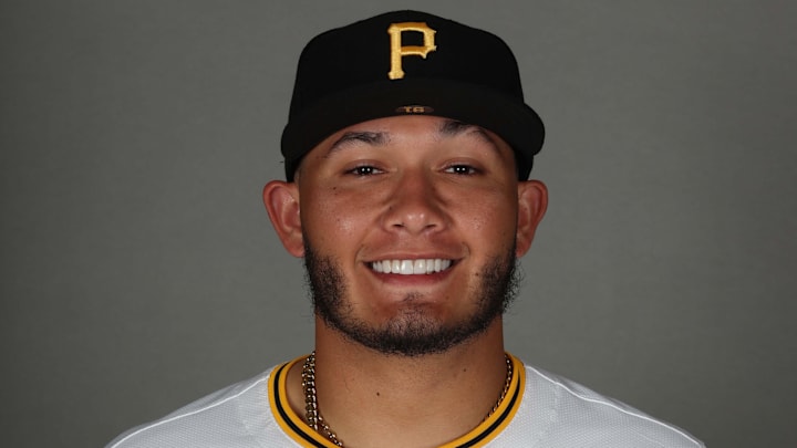 Feb 18, 2025; Bradenton, FL, USA; Pittsburgh Pirates catcher Omar Alfonzo (91) poses for a photo during media day at Pirate City. Mandatory Credit: Kim Klement Neitzel-Imagn Images