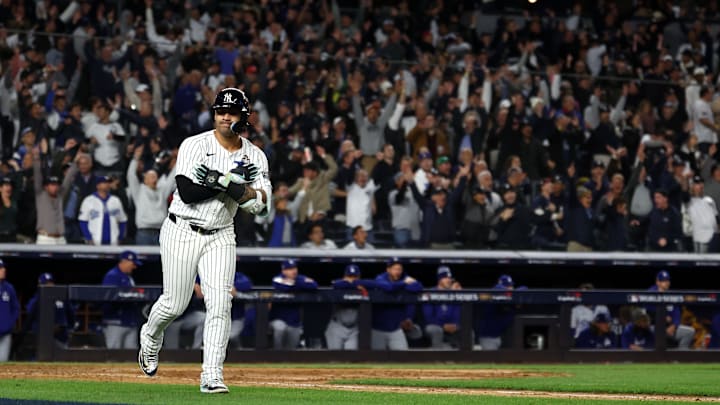 Oct 29, 2024; Bronx, New York, USA;  New York Yankees second baseman Gleyber Torres (25) reacts after hitting a three run home run against the Los Angeles Dodgers in the eighth inning during game four of the 2024 MLB World Series at Yankee Stadium. Mandatory Credit: Vincent Carchietta-Imagn Images