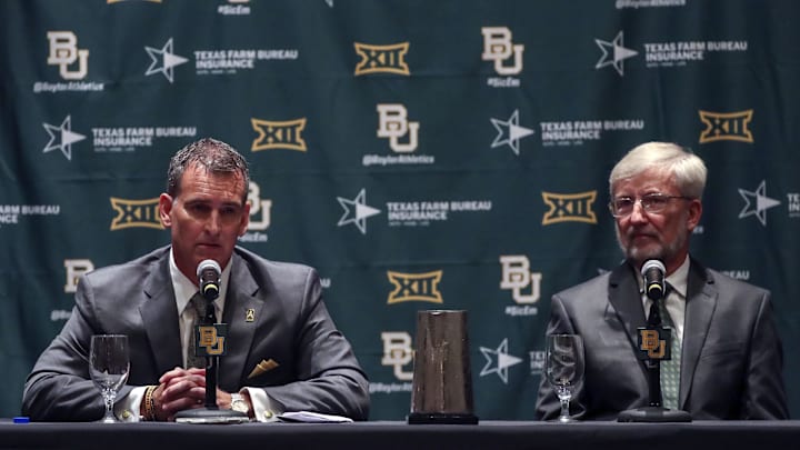 Jul 18, 2016; Dallas, TX, USA; Baylor Bears interim president David E. Garland (right) and new athletic director Mack Rhoades (left) speak at a press conference during the Big 12 Media Days at Omni Dallas Hotel. Mandatory Credit: Kevin Jairaj-Imagn Images Jul 18, 2016; Dallas, TX, USA; Baylor Bears interim president David E. Garland (right) and new athletic director Mack Rhoades (left) speak at a press conference during the Big 12 Media Days at Omni Dallas Hotel. Mandatory Credit: Kevin Jairaj-Imagn Images