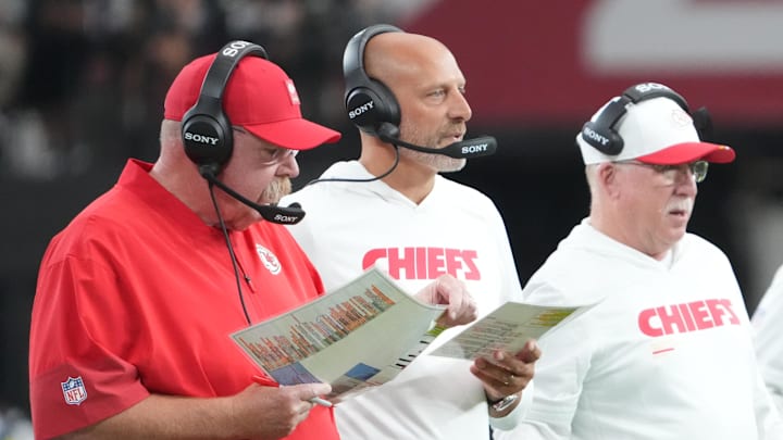 Aug 9, 2025; Glendale, Arizona, USA; Kansas City Chiefs head coach Andy Reid and staff look on against the Arizona Cardinals during the first half at State Farm Stadium. Mandatory Credit: Joe Camporeale-Imagn Images