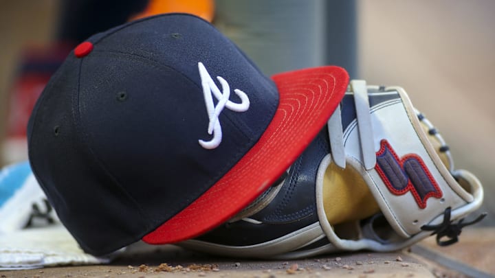 May 31, 2019; Atlanta, GA, USA; Detailed view of hat and glove of Atlanta Braves center fielder Ronald Acuna Jr. (not pictured) against the Detroit Tigers in the fourth inning at SunTrust Park. Mandatory Credit: Brett Davis-Imagn Images
May 31, 2019; Atlanta, GA, USA; Detailed view of hat and glove of Atlanta Braves center fielder Ronald Acuna Jr. (not pictured) against the Detroit Tigers in the fourth inning at SunTrust Park. Mandatory Credit: Brett Davis-Imagn Images