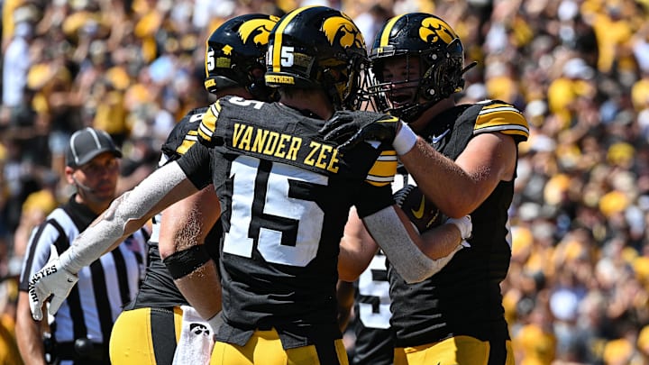 Aug 31, 2024; Iowa City, Iowa, USA; Iowa Hawkeyes wide receiver Reece Vander Zee (15) and tight end Luke Lachey (85) react after a touchdown by Vander Zee during the fourth quarter against the Illinois State Redbirds at Kinnick Stadium. Mandatory Credit: Jeffrey Becker-Imagn Images