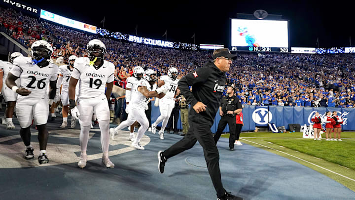 Cincinnati Bearcats head coach Scott Satterfield takes the field with the team prior to a college football game between the Brigham Young Cougars and the Cincinnati Bearcats, Friday, Sept. 29, 2023, at LaVell Edwards Stadium in Provo, Utah.