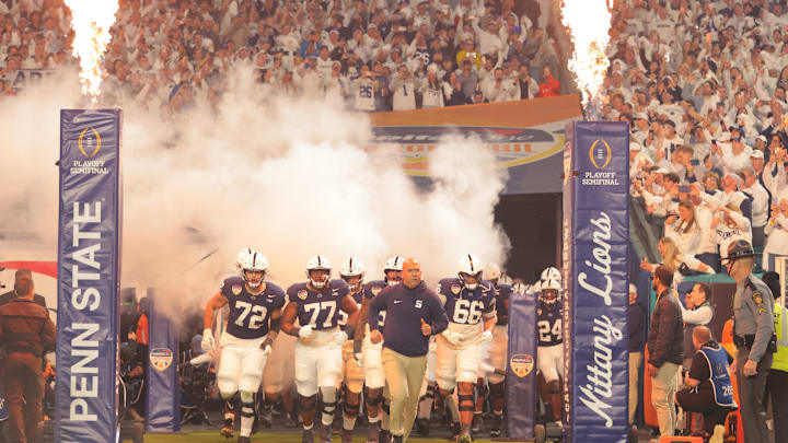 Penn State coach James Franklin leads the Nittany Lions onto the field for the Orange Bowl against Notre Dame.