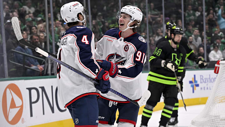 Feb 2, 2025; Dallas, Texas, USA; Columbus Blue Jackets center Cole Sillinger (4) and center Kent Johnson (91) celebrates a goal scored by Sillinger against the Dallas Stars during the first period at the American Airlines Center. Mandatory Credit: Jerome Miron-Imagn Images Feb 2, 2025; Dallas, Texas, USA; Columbus Blue Jackets center Cole Sillinger (4) and center Kent Johnson (91) celebrates a goal scored by Sillinger against the Dallas Stars during the first period at the American Airlines Center. Mandatory Credit: Jerome Miron-Imagn Images