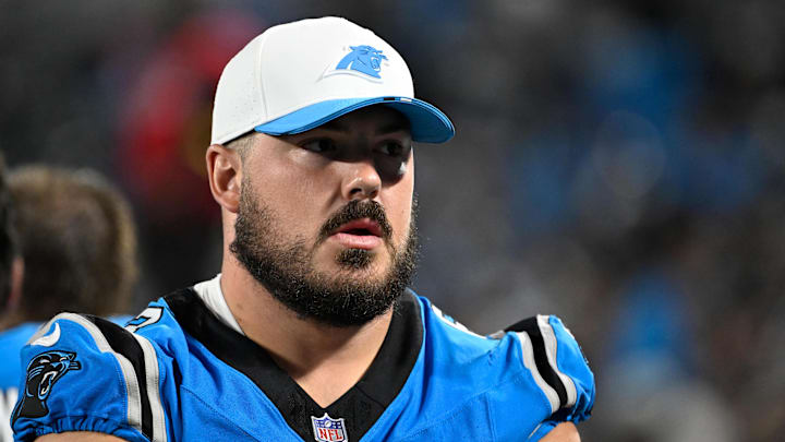 Aug 8, 2025; Charlotte, North Carolina, USA; Carolina Panthers center Austin Corbett (63) on the sidelines in the fourth quarter at Bank of America Stadium. Mandatory Credit: Bob Donnan-Imagn Images