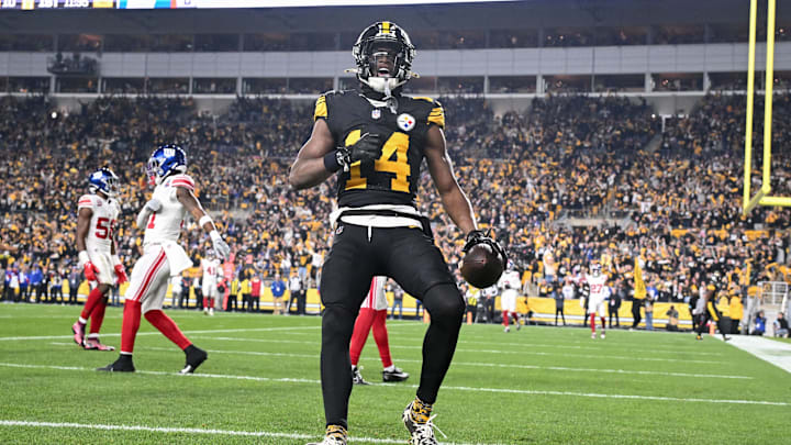 Oct 28, 2024; Pittsburgh, Pennsylvania, USA; Pittsburgh Steelers wide receiver George Pickens (14) celebrates a touchdown pass that was called back for a penalty against the New York Giants during the first half at Acrisure Stadium. Mandatory Credit: Barry Reeger-Imagn Images