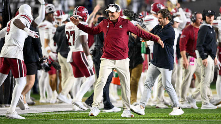 Nov 9, 2024; Nashville, Tennessee, USA;  South Carolina Gamecocks head coach Shane Beamer celebrates the win with defensive back Vicari Swain (4) against the Vanderbilt Commodores during the second half at FirstBank Stadium. Mandatory Credit: Steve Roberts-Imagn Images