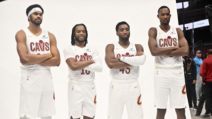 Sep 29, 2025; Cleveland, OH, USA;  Cleveland Cavaliers center Jarrett Allen (31) and guard Darius Garland (10) and guard Donovan Mitchell (45) and forward Evan Mobley (4) poses for a photo during media day at Rocket Arena. Mandatory Credit: Ken Blaze-Imagn Images