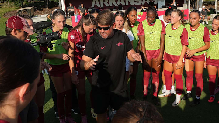 Arkansas coach Coby Hale talks to the Arkansas players before an exhibition match against UT Martin on Tuesday.