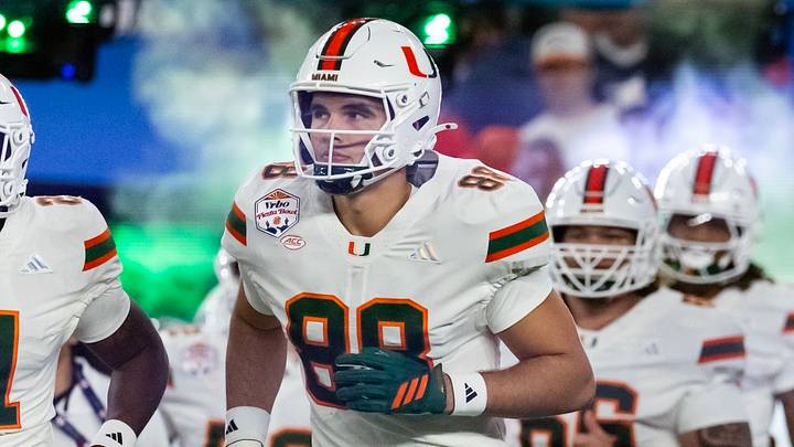 Jan 8, 2026; Glendale, AZ, USA; Miami Hurricanes tight end Luka Gilbert (88) against the Mississippi Rebels during the 2026 Fiesta Bowl and semifinal game of the College Football Playoff at State Farm Stadium. Mandatory Credit: Mark J. Rebilas-Imagn Images
