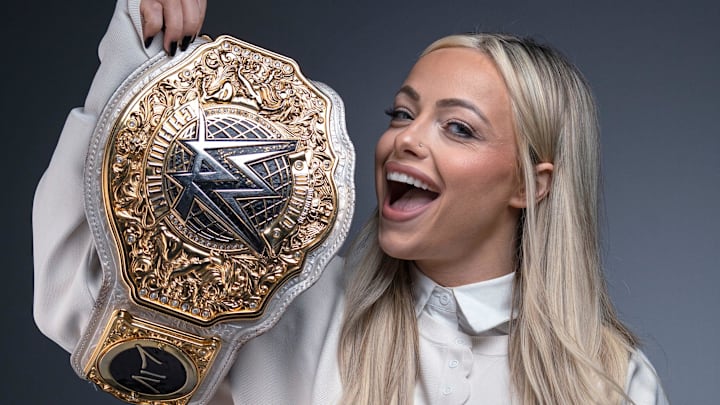 WWE women’s world champion Liv Morgan shows her champion belt in Indianapolis. 