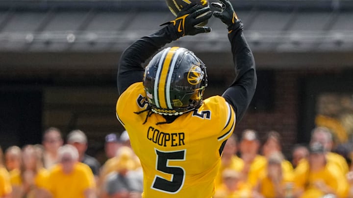 Sep 14, 2024; Columbia, Missouri, USA; Missouri Tigers wide receiver Mookie Cooper (5) catches a pass against the Boston College Eagles during the second half at Faurot Field at Memorial Stadium. Mandatory Credit: Denny Medley-Imagn Images