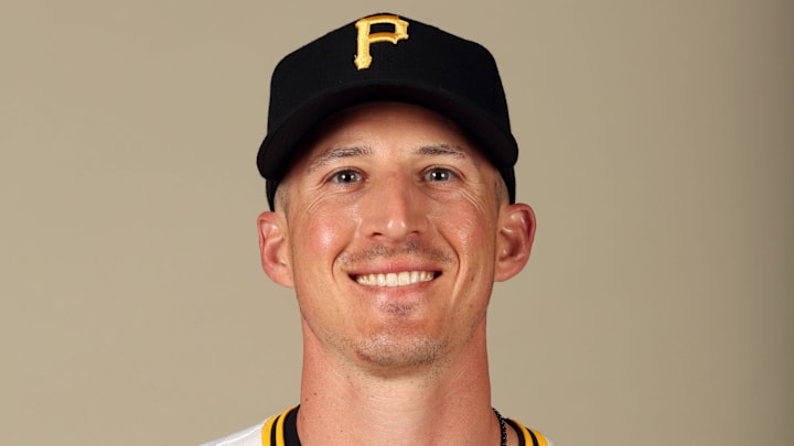 Feb 20, 2024; Bradenton, FL, USA;  Pittsburgh Pirates coach Radley Haddad (86) poses for a photo during photo day at Pirate City. Mandatory Credit: Kim Klement Neitzel-Imagn Images