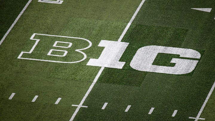 A patchwork of turf surrounds the Big Ten logo