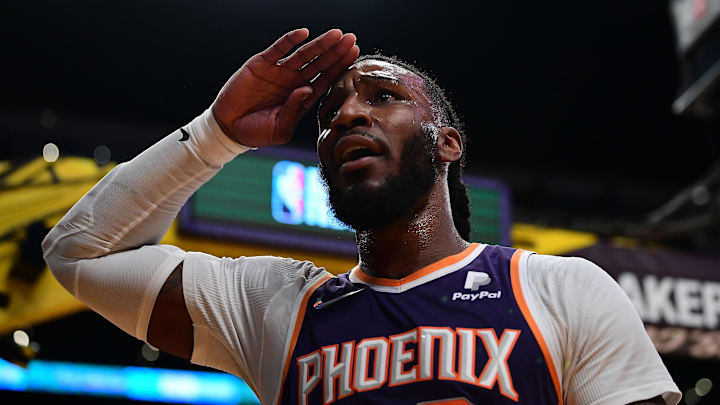 Phoenix Suns forward Jae Crowder reacts after blocking a shot against Los Angeles Lakers guard Talen Horton-Tucker during the first half at Staples Center on December 21, 2021.