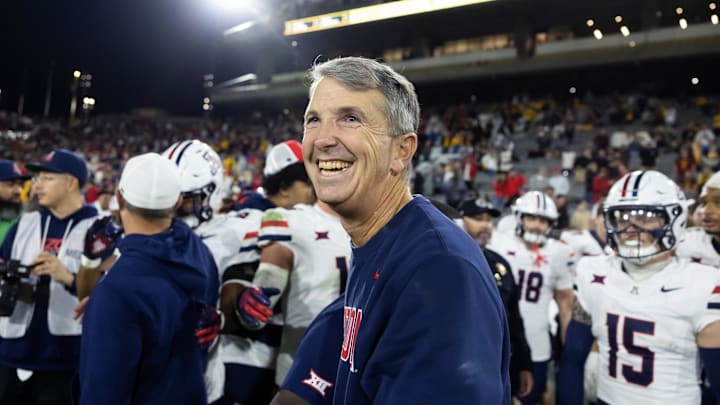 Nov 28, 2025; Tempe, Arizona, USA; Arizona Wildcats head coach Brent Brennan celebrates against the Arizona State Sun Devils during the 99th Territorial Cup at Mountain America Stadium. Mandatory Credit: Mark J. Rebilas-Imagn Images