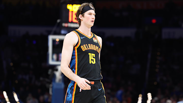 Dec 29, 2024; Oklahoma City, Oklahoma, USA; Oklahoma City Thunder center Branden Carlson (15) walks down the court during a time out against the Memphis Grizzlies during the fourth quarter at Paycom Center. Mandatory Credit: Alonzo Adams-Imagn Images
