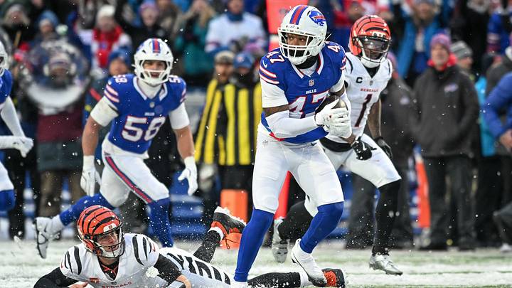 Buffalo Bills cornerback Christian Benford (47) returns an interception of Buffalo Bills safety Taylor Rapp (on the ground) for a touchdown in the fourth quarter at Highmark Stadium.