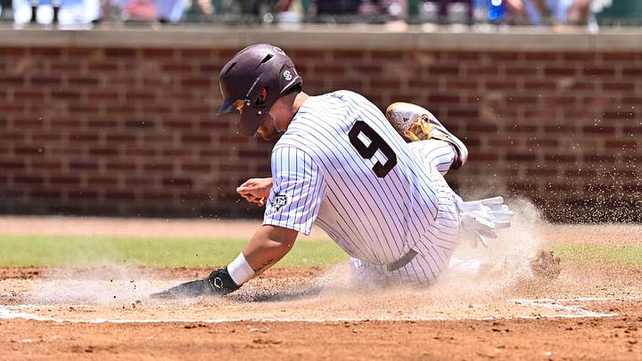 Jun 8, 2024; College Station, TX, USA; Texas A&M utility Gavin Grahovac (9) slides into home plate to score during the first inning against the Oregon at Olsen Field, Blue Bell Park Mandatory Credit: Maria Lysaker-Imagn Images