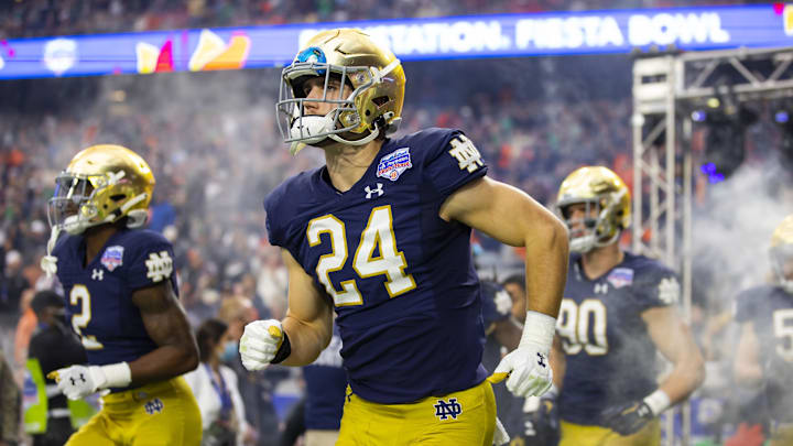 Jan 1, 2022; Glendale, Arizona, USA; Notre Dame Fighting Irish linebacker Jack Kiser (24) against the Oklahoma State Cowboys in the 2022 Fiesta Bowl at State Farm Stadium.