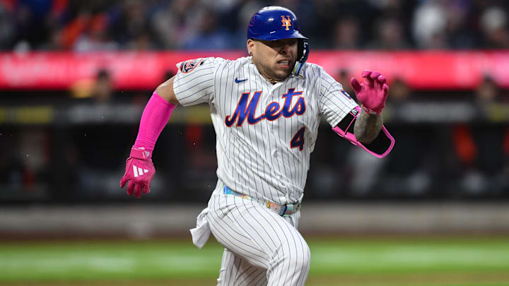 May 12, 2026; New York City, New York, USA; New York Mets catcher Francisco Alvarez (4) races to first base after driving in a run on a fielders choice during the second inning against the Detroit Tigers at Citi Field. Mandatory Credit: John Jones-Imagn Images