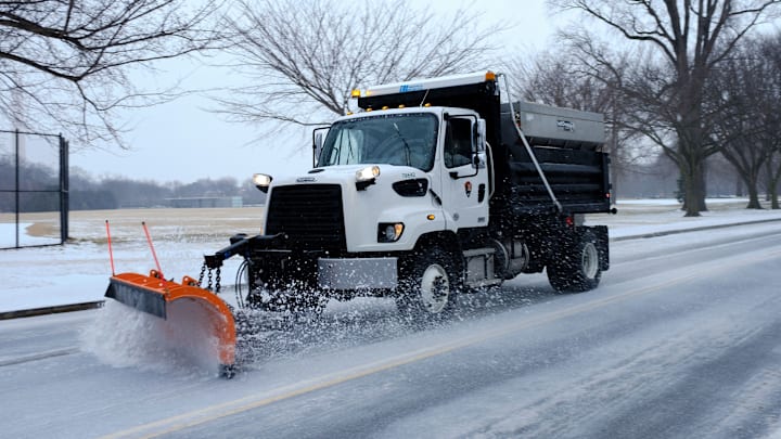 A snow plow. Plowing snow. A snow plow. Plowing snow.