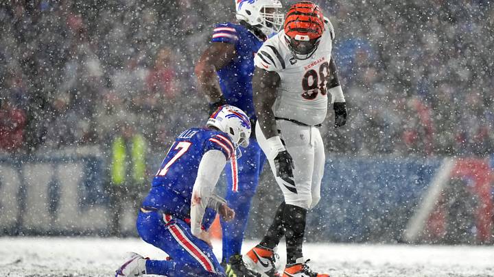 Jan 22, 2023; Orchard Park, New York, USA; Cincinnati Bengals defensive tackle DJ Reader (98) checks on Buffalo Bills quarterback Josh Allen (17) after a hit in the fourth quarter during an AFC divisional round game at Highmark Stadium Jan 22, 2023; Orchard Park, New York, USA; Cincinnati Bengals defensive tackle DJ Reader (98) checks on Buffalo Bills quarterback Josh Allen (17) after a hit in the fourth quarter during an AFC divisional round game at Highmark Stadium