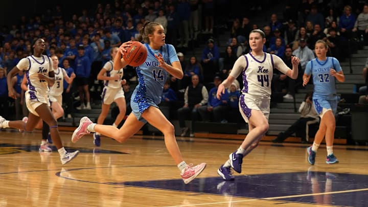 Waukee Northwest's Leah Janulewicz drives the ball to the basket against Waukee earlier this year.