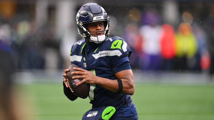 Dec 22, 2024; Seattle, Washington, USA; Seattle Seahawks quarterback Geno Smith (7) during warmups before the game against the Minnesota Vikings at Lumen Field. Mandatory Credit: Steven Bisig-Imagn Images