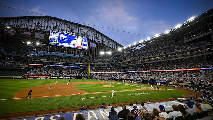 Apr 5, 2024; Arlington, Texas, USA; A view of the open roof and the sky and the field and the fans during the game between the Texas Rangers and the Houston Astros at Globe Life Field.
