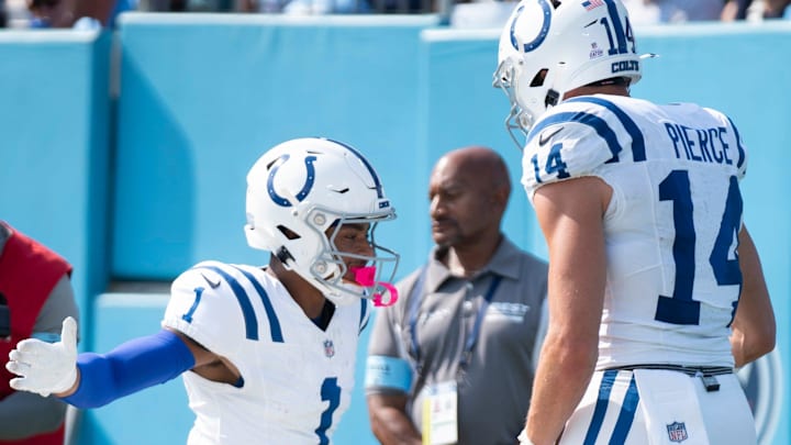 Indianapolis Colts wide receiver Josh Downs (1) and wide receiver Alec Pierce (14) celebrate his touchdown against the Tennessee Titans during the first quarter their game at Nissan Stadium in Nashville, Tenn., Sunday, Oct. 13, 2024.