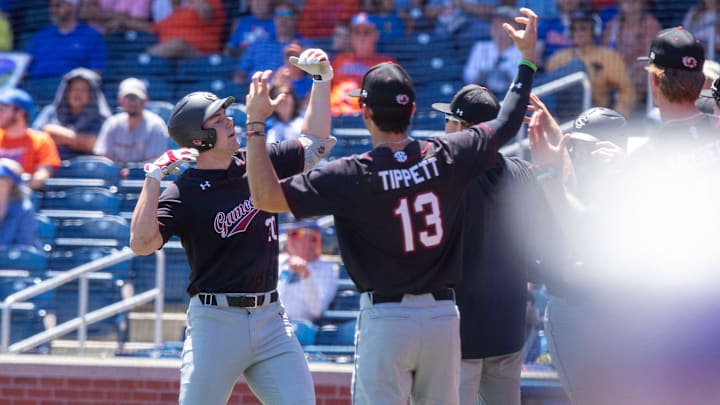 Gamecock right fielder Ethan Petry (20) celebrates his two-run homer in the top of the third inning with his teammates Gamecock right fielder Ethan Petry (20) celebrates his two-run homer in the top of the third inning with his teammates