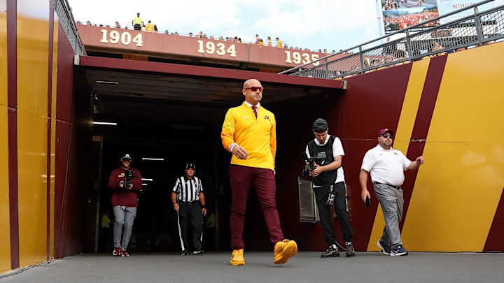 Aug 28, 2025; Minneapolis, Minnesota, USA; Minnesota Golden Gophers head coach P.J. Fleck walks onto the field before the game against the Buffalo Bulls at Huntington Bank Stadium. Mandatory Credit: Matt Krohn-Imagn Images Aug 28, 2025; Minneapolis, Minnesota, USA; Minnesota Golden Gophers head coach P.J. Fleck walks onto the field before the game against the Buffalo Bulls at Huntington Bank Stadium. Mandatory Credit: Matt Krohn-Imagn Images